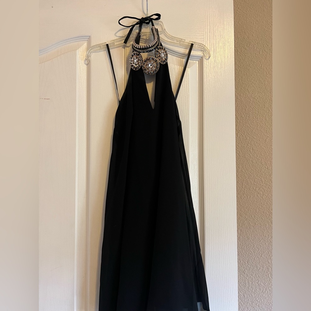 Beautiful black dress with detailed neckline